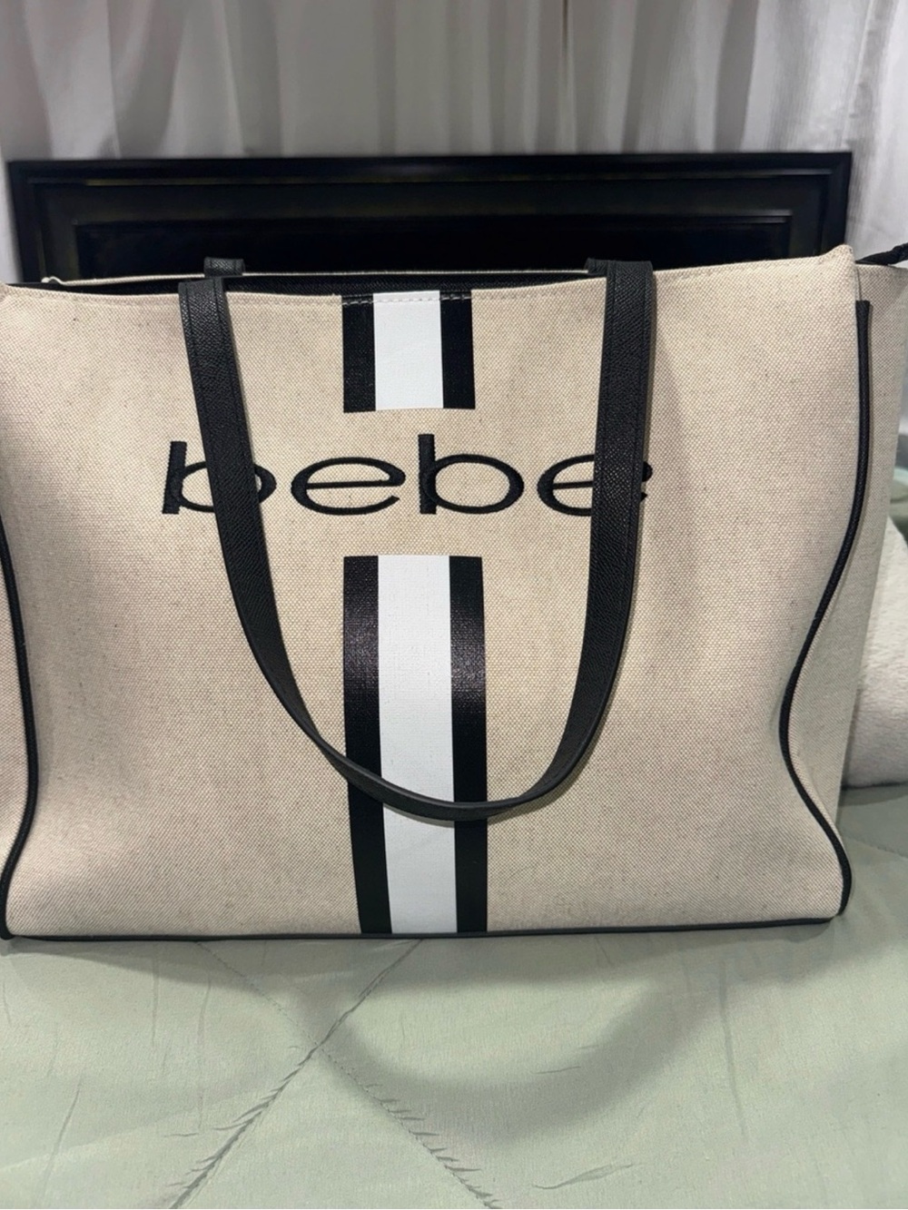 bebe Neutral Canvas Tote with Black Stripe and Logo